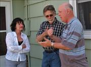 Denny explains something to Kathy & Gerry